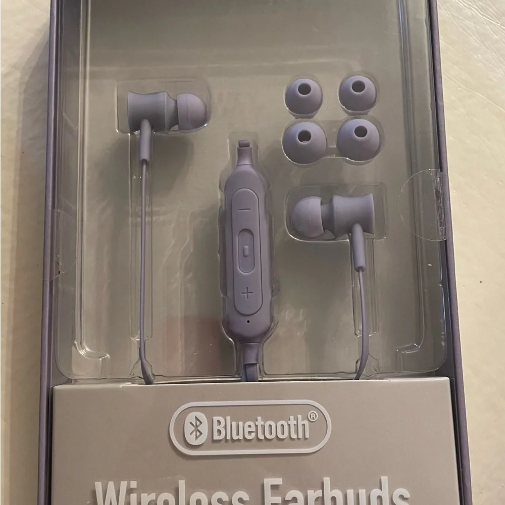Wireless Bluetooth Earbuds in Purple-Brand New. Sealed.